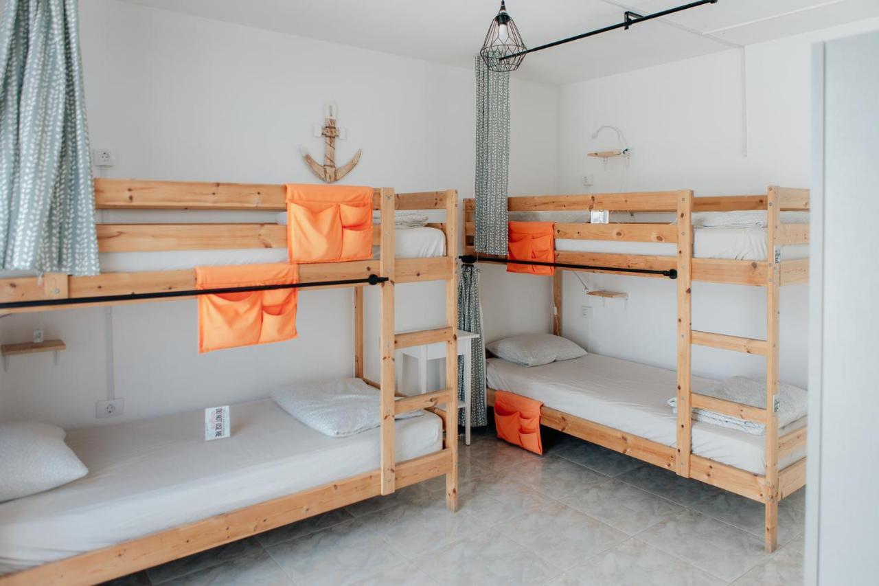Bed in 4-Bed Dormitory Room with Private Bathroom and Terrace