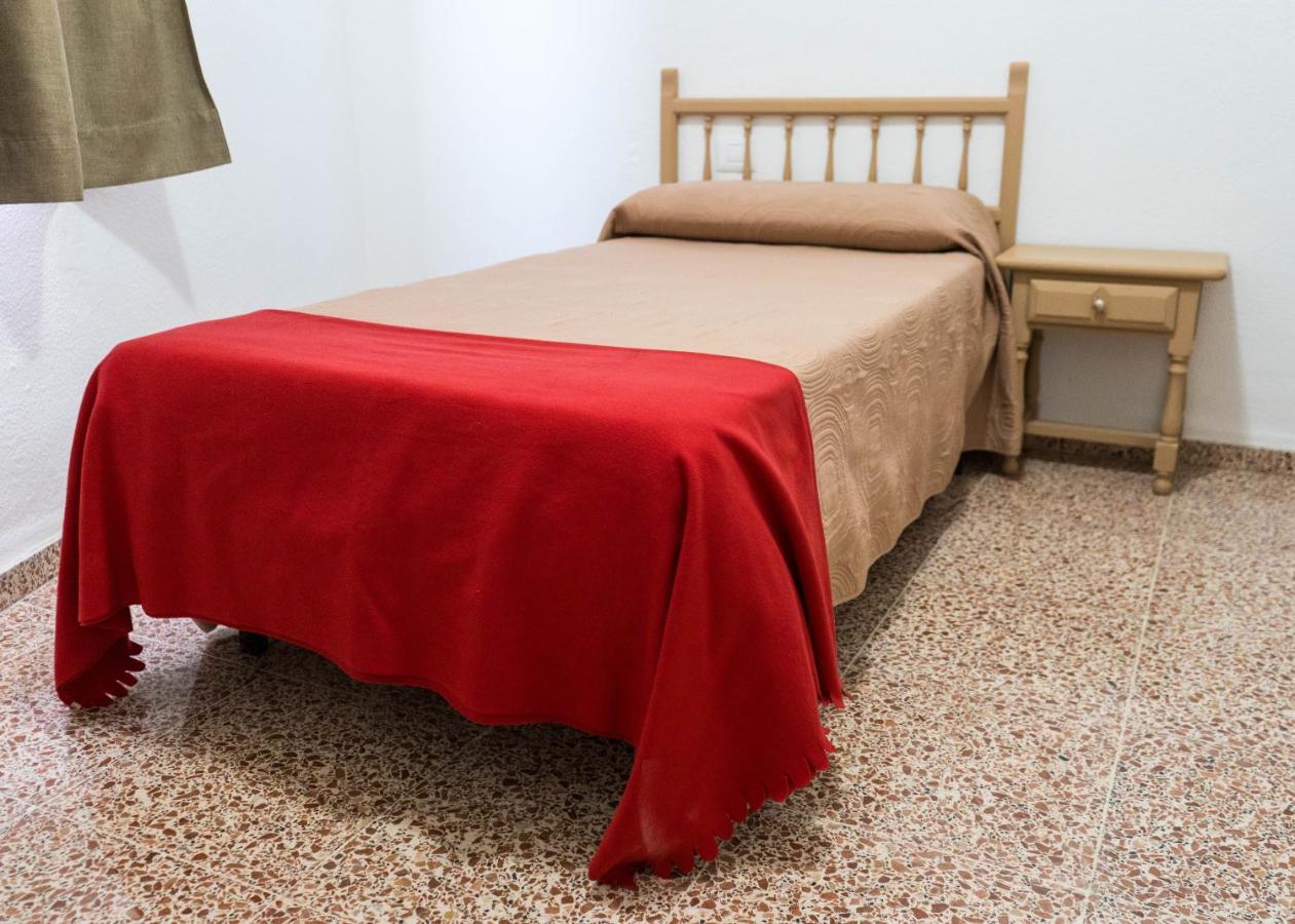 Habitación Individual con ducha y aseo compartidos